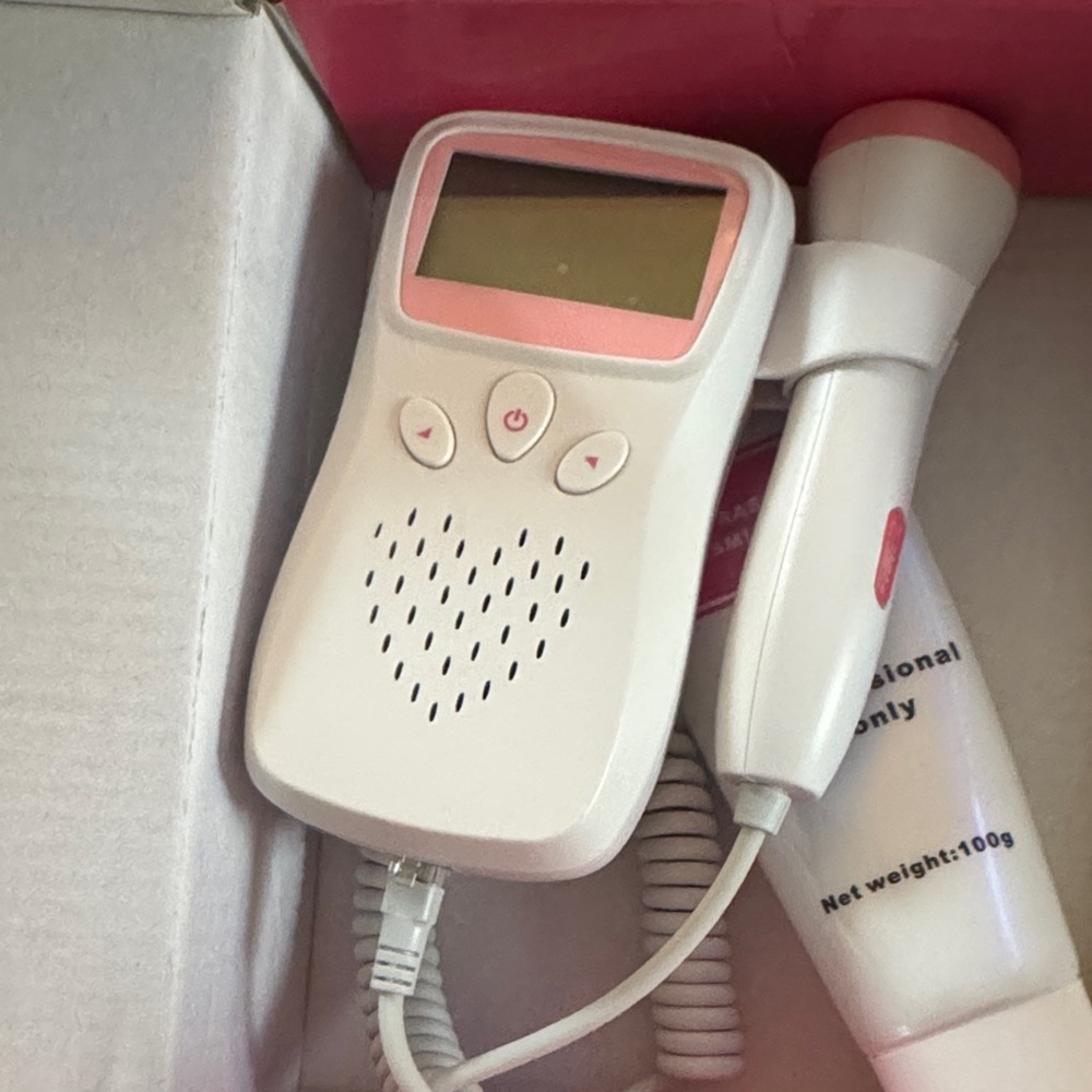 White and Pink Heartbeat Monitor